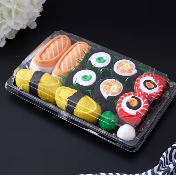The sushi sock box seen from above - nigiri, maki and wasabi
